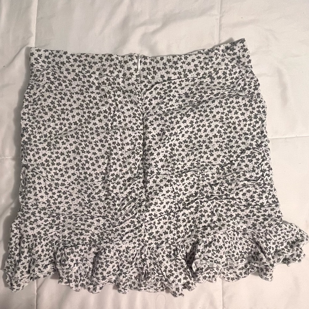Green and white flowered skirt